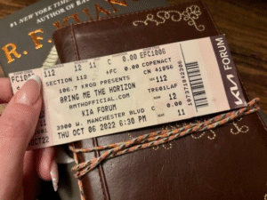 image of hand holding a concert ticket to Bring Me the Horizon
