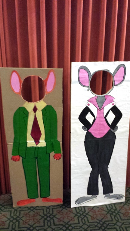 Teen volunteers at Central Library painted these cardboard cutouts for a Geronimo Stilton event last week.  Geronimo (left) was created by Helen A. and Thea (right) was created by Mariah D. Both artists free handed these mice paintings.