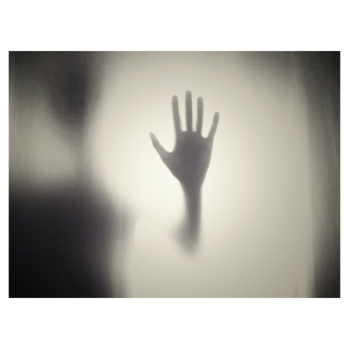 hand against frosted glass